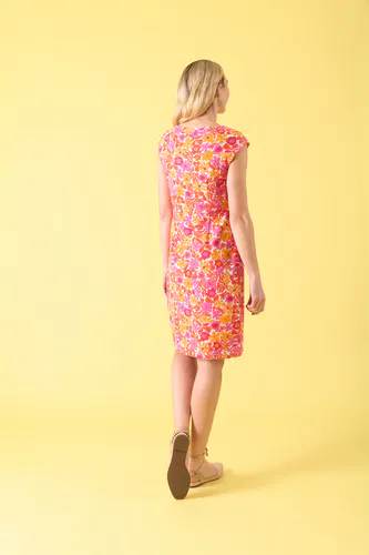 Model wearing Floral Dream Lancaster Dress By Charlie Jane Available at Beetees Nelson